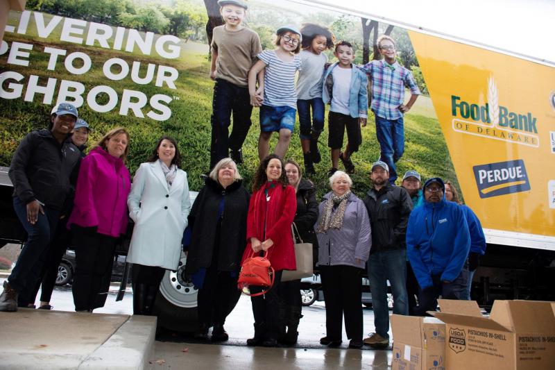 Unveiling Food Bank of Delaware’s new refrigerated truck are representatives from Perdue, USDA, Harry K Foundation, Acme and the food bank. Shown are (l-r) Brittany Baker, Leanna Mostrowski, Kim Huey, Kim Nechay, Patricia Beebe, Lisa Fitzgerald, Dana Ward, Laura Glascoe, Isaac Ferreira, Gabriella Hartsock, Larry Henley and Laura Coates. SUBMITTED PHOTO